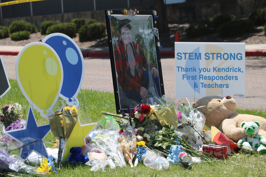 A memorial sits outside of STEM School Highlands Ranch, where a shooting on May 7 left one student dead and eight others injured. Students were given the option to go back to school on May 15 to finish out the year.